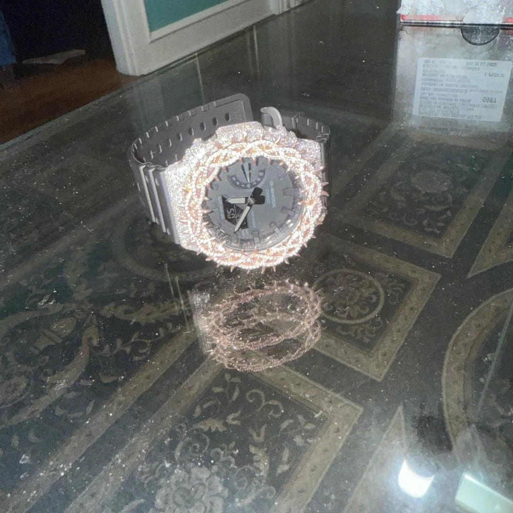 Casio G-Shock Black and Silver Watch with Rose Gold Accents